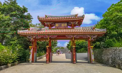 Stroll through the vermillion gate at Shuri Castle.