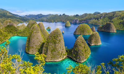 Discover Balbulal Lagoon's wild beauty and Pulau Misool's white-sand beaches and lush landscapes.