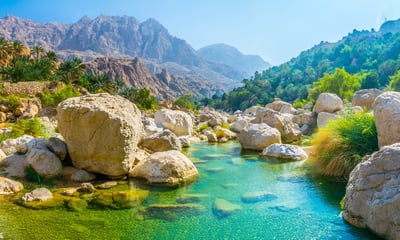 Wadi Shab in Oman, is a stunning gorge with warm emerald-green natural pools.