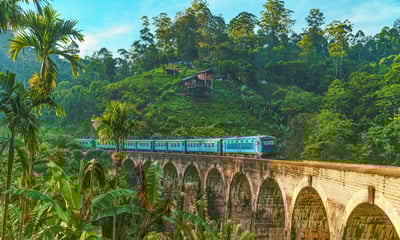 Ride the Nine Arch Bridge, a scenic railway viaduct in Sri Lanka.
