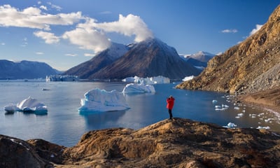Cruise through Scoresbysund's network of fjords, glaciers and icebergs.