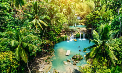 Witness the stunning Cambugahay Waterfalls in Siquijor, the Phillippines.