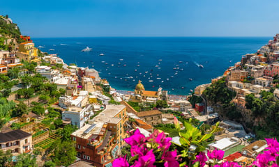 Experience the beauty of Southern Italy, including Positano and the Amalfi Coast.