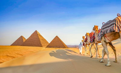 Marvel at the mighty Sphinx and Pyramids at Giza.