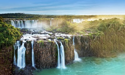 Experience the raw power of Argentina's Iguazu Falls.