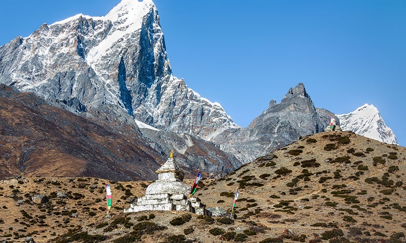 Visit stupas during your rest day in the village of Dingboche.