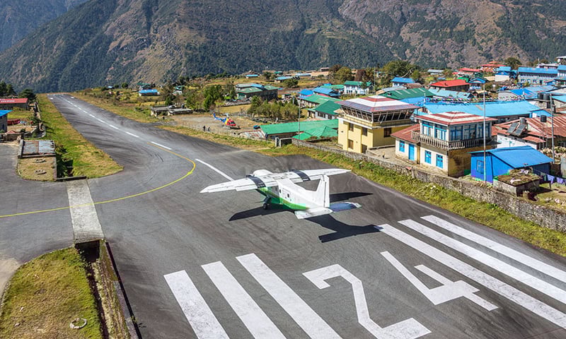 Enjoy an early morning scenic flight to the small mountain airport of Lukla.