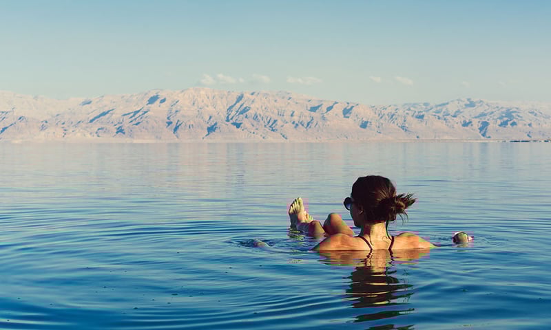 The Dead Sea's high salt density reportedly offers healing properties and makes floating easier.