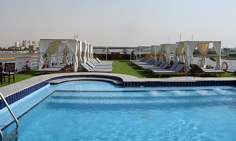 Swim in the sparkling pool while you admire Egypt's desert landscapes aboard MS Blue Shadow.