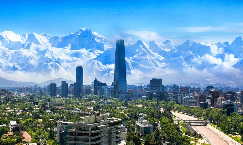 Santiago, Chile’s capital and largest city, sits in a valley surrounded by the snow-capped Andes.