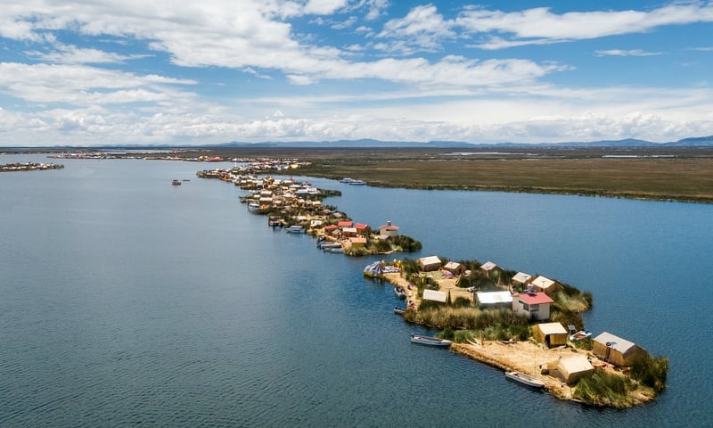 Marvel at the Floating Islands of the Uros on Titicaca Lake near Puno, Peru.