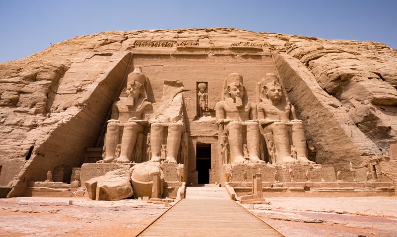 Pharaoh Rameses II colossal statues in front of Abu Simbel temple near Aswan, Egypt.
