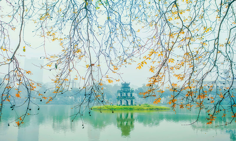 Fall in love with Thap Rua Tower (Turtle Tower) on Hoan Kiem Lake in central Hanoi, Vietnam.