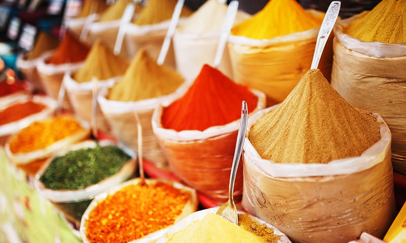 Indian spices of different colours and shades, flavours and textures in a local market stall, Delhi.