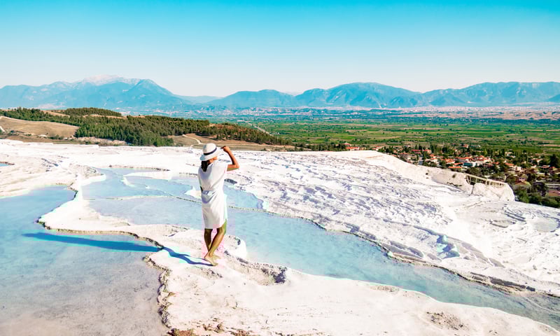 Pamukkale's mineral-rich limestone thermal pools are known as "cotton castle", southwestern Türkiye.