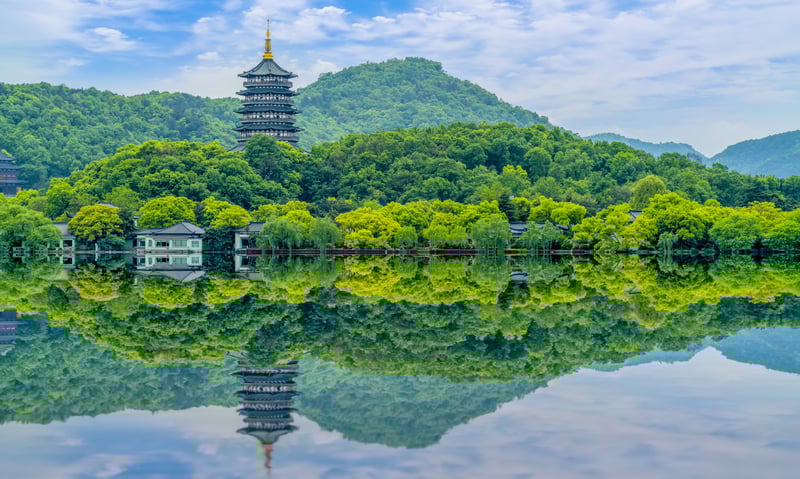Enjoy a scenic boat ride on the UNESCO-listed West Lake in Hangzhou, China.