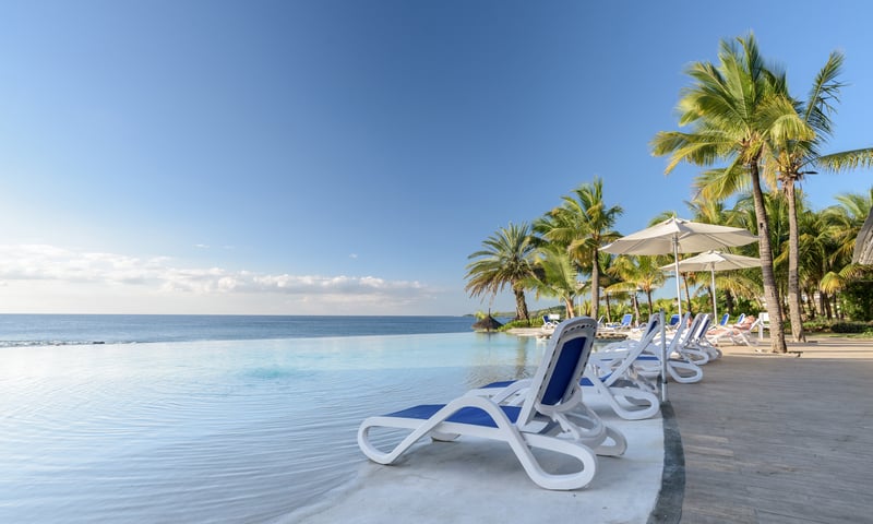 Relax by the pool at Anelia Resort & Spa, Mauritius (Extension Itinerary only).