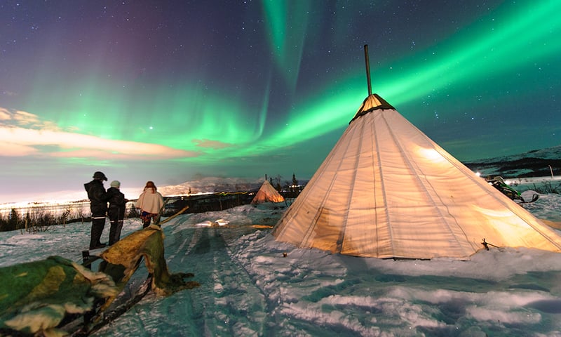 Imagine the nightly spectacle of colours from a traditional Sami reindeer skin tent