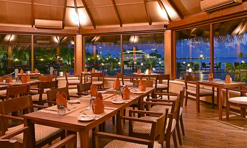 Enjoy spectacular tropical evenings at the resort's Sunset Restaurant & Bar