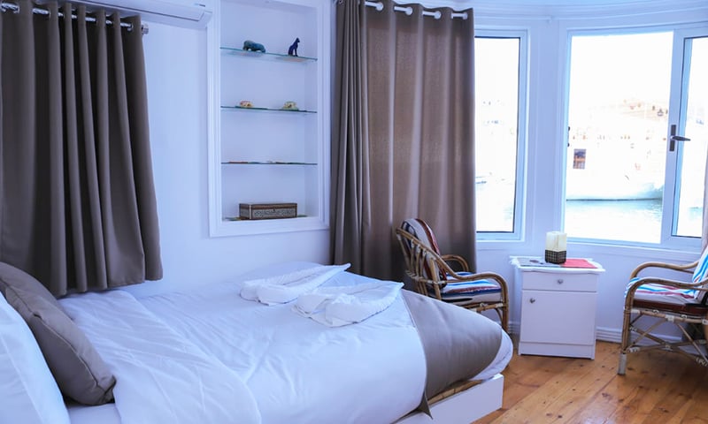 Get comfortable with a great view from your spacious cabin as you cruise along the Nile River.