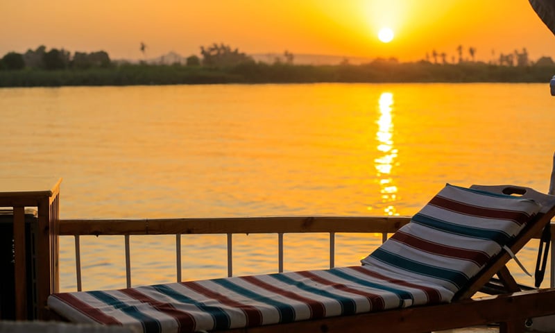 Choose your deckchair to relax and watch the sun sets over the Nile River.