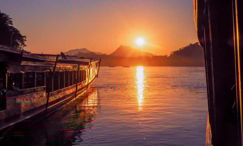 Visit local villages as you cruise along the Mekong River to Pakbeng and Luang Prabang, Laos.