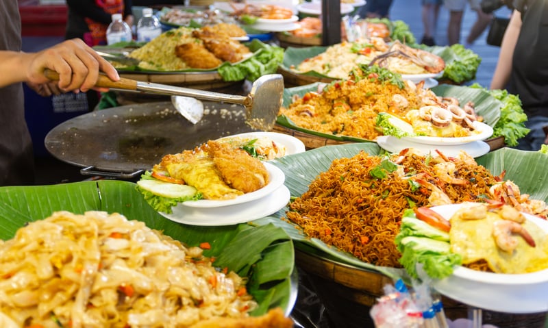 Sample authentic Thai cuisine on a guided tour of Chiang Mai's night markets, optional excursion.