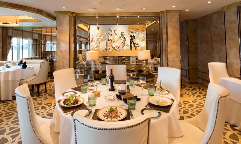 Queen Elizabeth's exquisite Verandah restaurant offers world-class cuisine (charges apply).