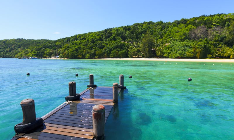Catch a boat to the tropical island of Manukan Island, Malaysia.