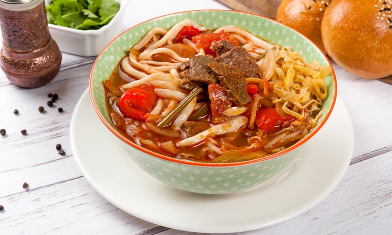 Make Lagman, a traditional Uighur dish made of pulled noodles, meat and vegetables.