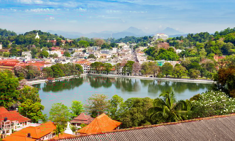 Travel to Kandy, the last royal capital of Sri Lankan Kings, cradled among misty hills.