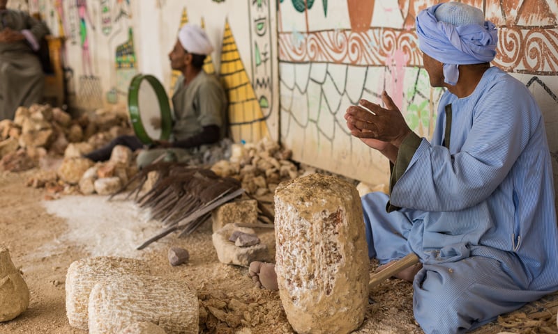 Street vendors ply their trade in Luxor, Egypt.
