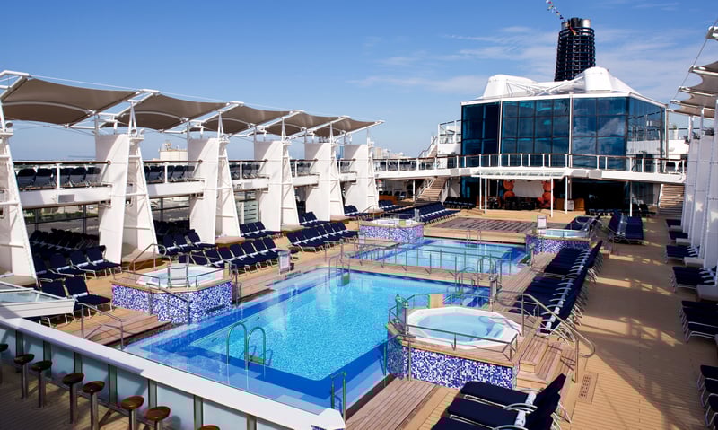 Lounge by the pool or soak in a hot tub on the Celebrity Solstice Pool Deck.