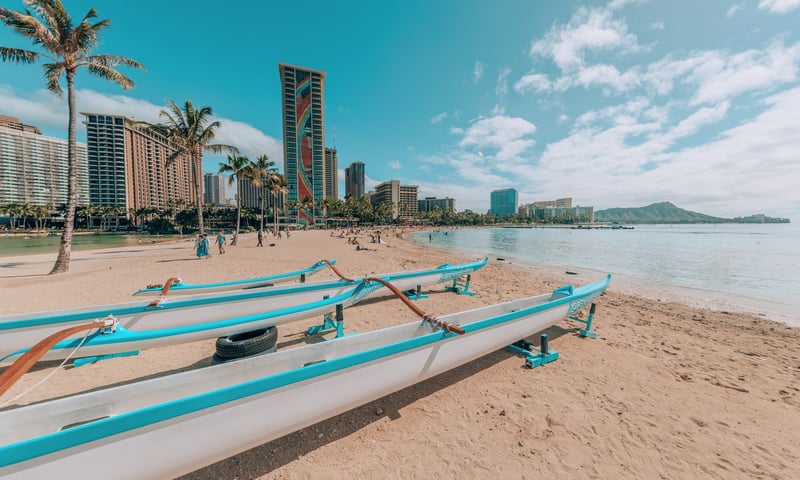 Stay just steps from Waikiki Beach, with views of Diamond Head.
