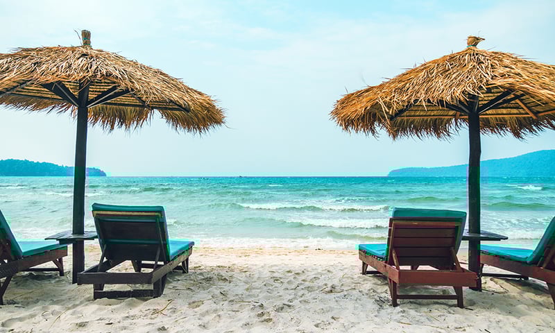 Relax and soak up the sun from a white sand beach on Koh Rong Sanloem.