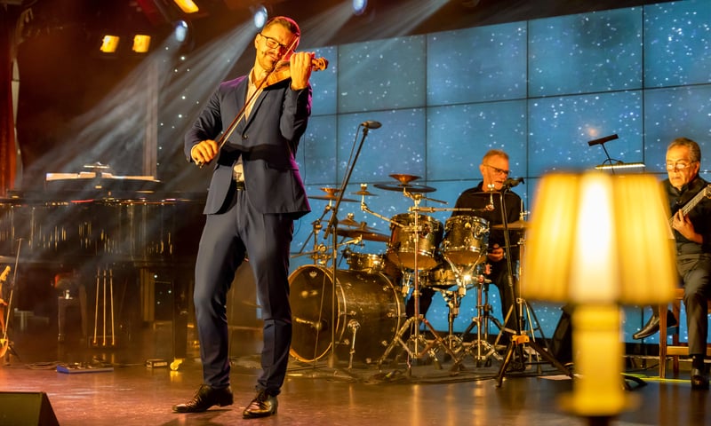 Watch a performance by Signature Singers & Dancers aboard the Azamara Journey.