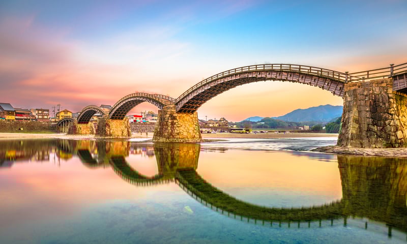 Cross the elegant Kintaikyo Bridge in Iwakuni, Japan.