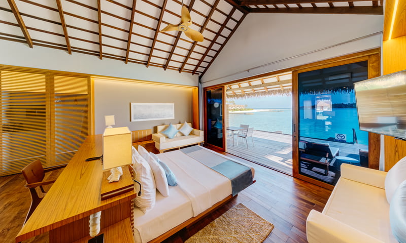 Upgrade to an Overwater Bungalow at Cinnamon Velifushi Maldives.