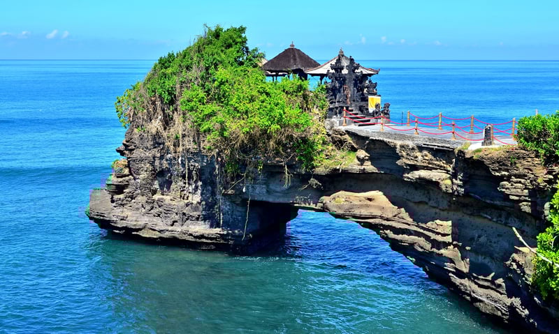 The striking Tanah Lot Temple in Beravab Village, Bali. (Optional activity)