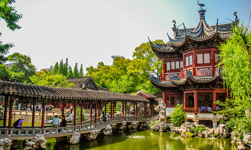 Join an optional tour of Yu Garden with its koi ponds and traditional covered bridges, Shanghai.