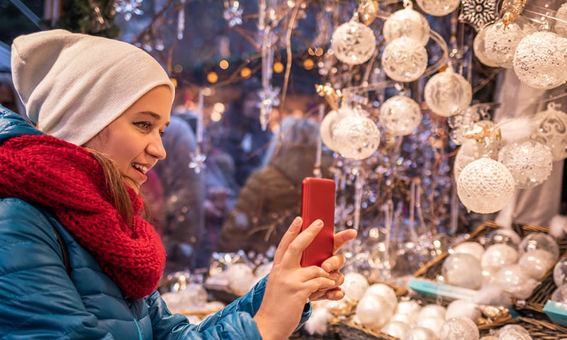 Passau's medieval square is alive with singing carolers and overflowing Christmas markets.