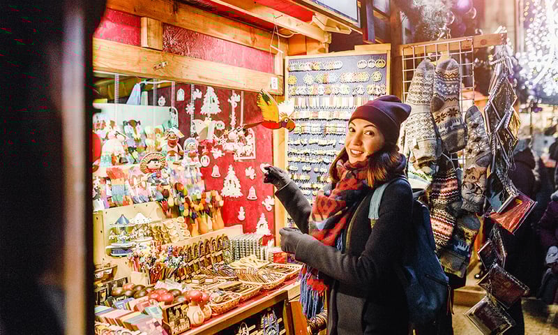 Search for Christmas souvenirs at the twinkling Christmas market in Prague.