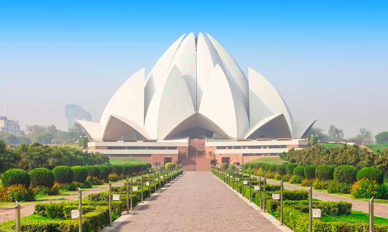 Stand in awe of the Lotus Temple in Delhi, India.