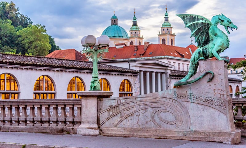 Cross the renowned Dragon Bridge on a walking tour in Ljubljana, Slovenia.