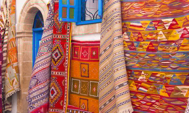 See colourful carpets throughout Essaouira, Morocco.