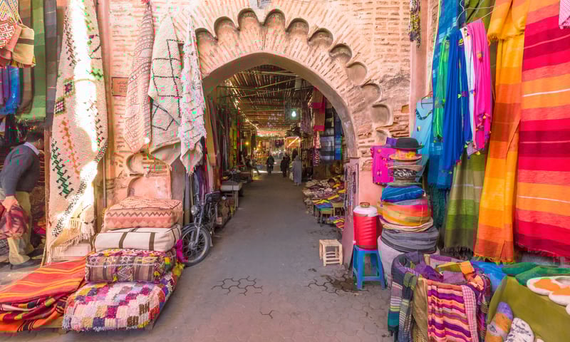 Explore the vibrant markets in Marrakesh, Morocco.