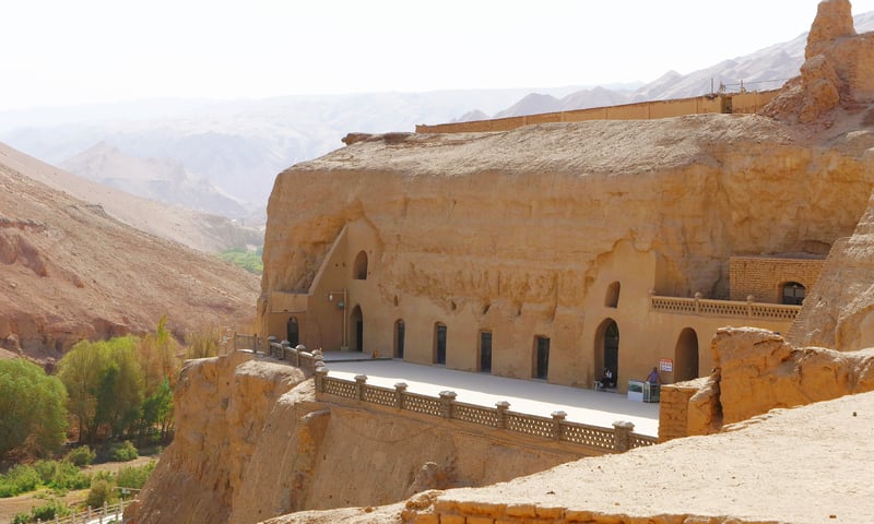 Visit the awe-inspiring Bezeklik Thousand Buddha Caves near Xinjiang, China.