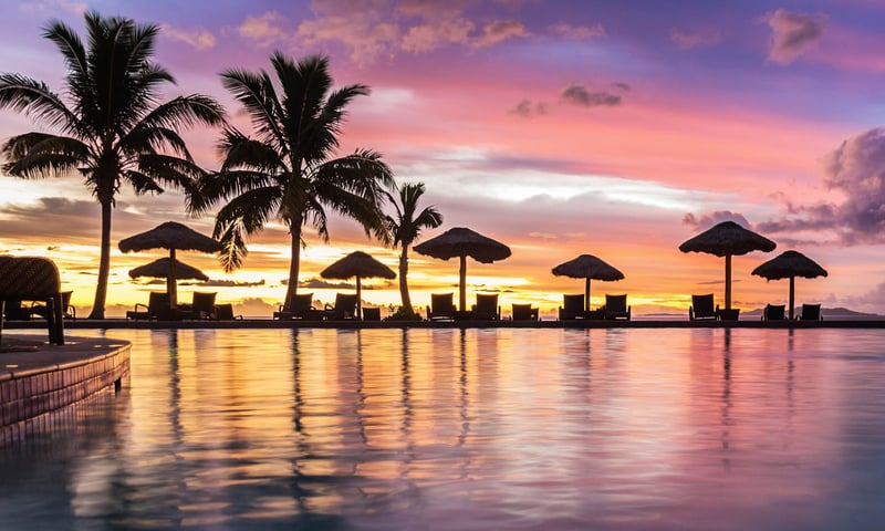 Enjoy a sunset in Denarau, Fiji.