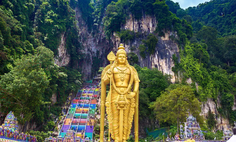 Climb the rainbow steps to Batu Caves, near Kuala Lumpur.