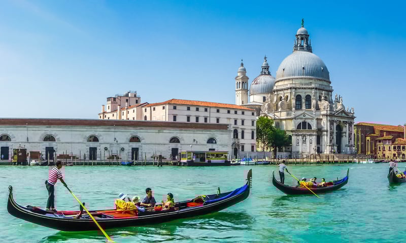 Treat yourself to an optional gondola ride in Venice, Italy (charges apply).